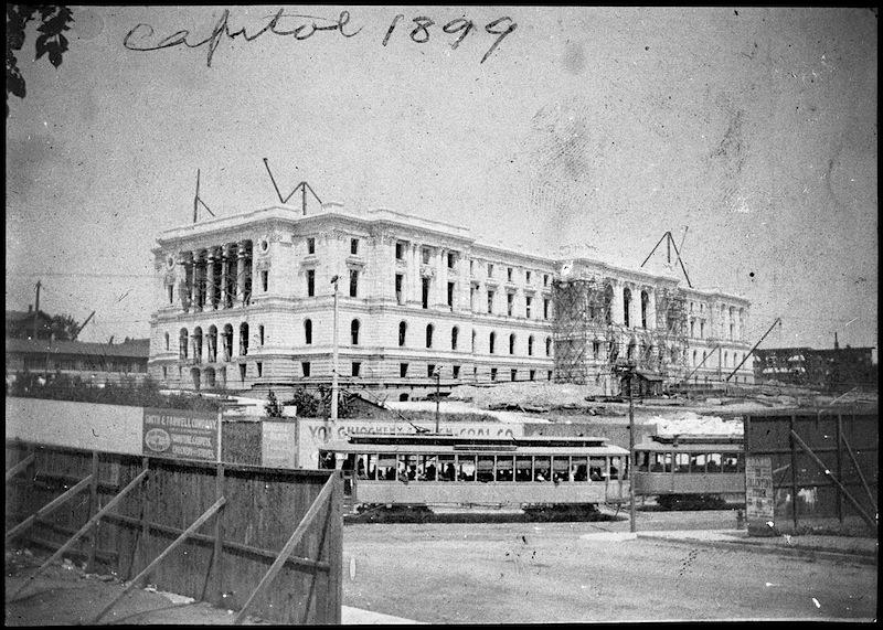 1899_Minnesota Capitol building with a street car in foreground
