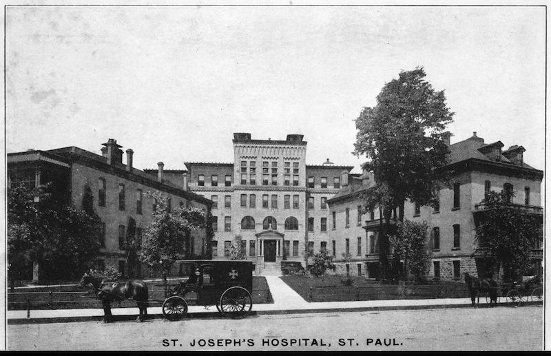 St. Joseph&#039;s Hospital with horse and ambulance, Saint Paul, Minnesota