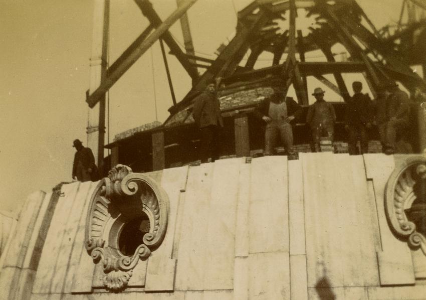 Workers atop Capitol dome