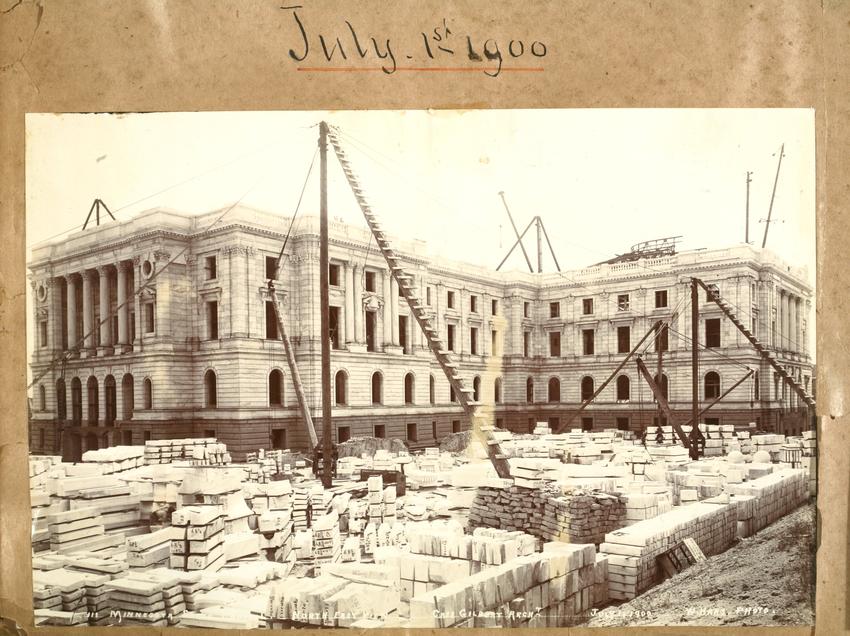 Capitol construction site showing a ladder made out of a tree trunks and lumber