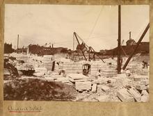 Minnesota State Capitol, SE Corner of the Foundation, Stone workers shaping and setting stone blocks, August 31, 1896